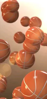 Basketballs in motion creating a dynamic sports wallpaper with vibrant orange tones.