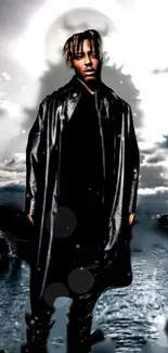 Man in black coat with cloudy sky background wallpaper.