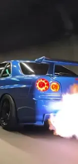 Blue sports car with flaming exhaust in motion.