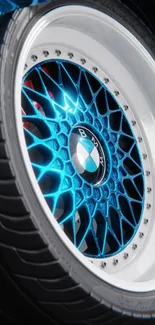 Dynamic BMW car wheel with blue intricate design pattern.