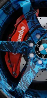 BMW wheel with dynamic blue and red design.