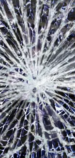 Shattered glass pattern on dark blue background wallpaper.