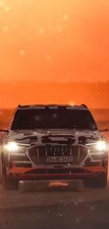 Dynamic car against a vibrant orange sunset with glowing lights.