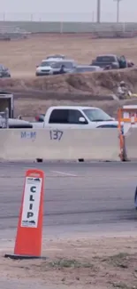 Car racing on a busy track during an exciting event.