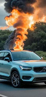 Car on a road with exploding flames and smoke in the background.