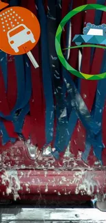 A vibrant car wash scene with red car and blue brushes covered in foam.