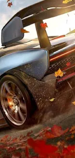 A dynamic car speeds through vibrant autumn leaves on a road.