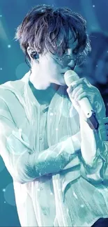 Live concert wallpaper with dynamic blue tones and energetic performer on stage.