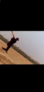 A dynamic cricket player hitting on an open field.