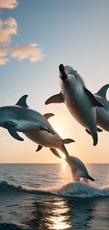 Three dolphins leap joyfully against a stunning sunset over the ocean.