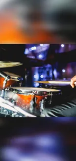 Vibrant drum set with energetic play in a dynamic music scene.