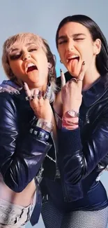 Two people in stylish leather jackets displaying a bold and energetic pose.