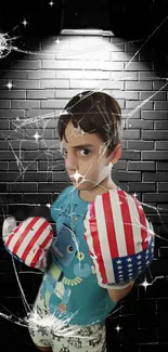 Young fighter with flag gloves against brick wall.