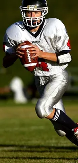 Focused football player in dynamic action on field.