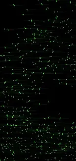 Dynamic mobile wallpaper with green particles on black.