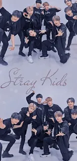 Energetic group posing in black outfits.