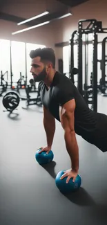 Man doing push-ups on medicine balls in a gym.