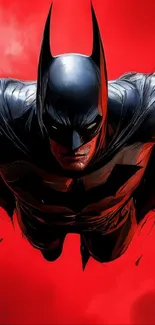 Dynamic hero in black suit against vivid red background.