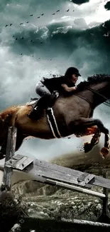 Rider and horse jump over an obstacle against a stormy sky.