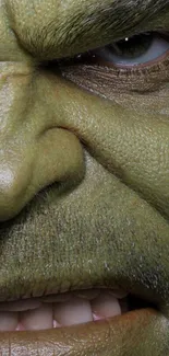 Close-up of Hulk's intense, green face for mobile wallpaper.