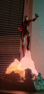 Iron Man statue illuminated with vibrant lighting in a decorative setting.