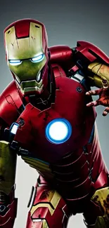 Iron suit with red and gold colors, glowing blue center, dynamic pose.