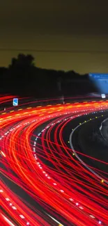 Dynamic light trails on a night highway, perfect for mobile wallpaper.