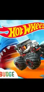 Hot Wheels monster truck with blue shark backdrop.