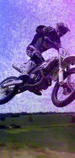 Motocross rider jumping with vibrant purple and blue background.