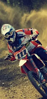 Motocross racer in action on dirt track.