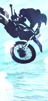 Silhouette of a motocross bike performing a stunt on a blue background.