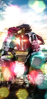 Motocross riders pause during sunset against a scenic sky.