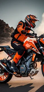 Motorcyclist in orange gear rides through dust on a rugged landscape.