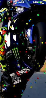 Dynamic motorcycle racing wallpaper with vibrant colors and confetti effect.