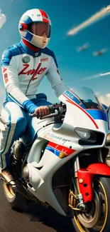 Motorcyclist in blue gear riding a sports bike on a sunny racetrack.