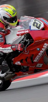 Red racing motorcycle in high-speed action.