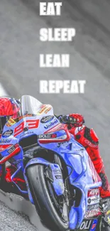 Motorcycle racer leaning on track with 'Eat Sleep Lean Repeat' text overlay.