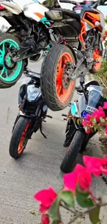 Motorcycle performing stunt with colorful wheels on a vibrant road.