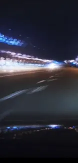 Neon highway with blurred motion at night.