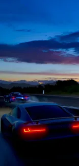 Night drive with fast cars under a twilight sky, perfect for mobile wallpaper.