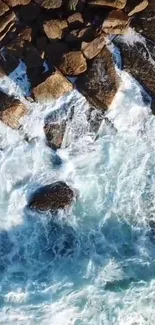 Dynamic ocean waves crashing against rugged rocks.