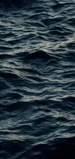 Dynamic ocean waves with deep blue tones, perfect for mobile wallpaper.