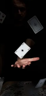 Dynamic scene of floating playing cards in dark atmosphere.