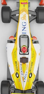 Overhead view of yellow racing car on track.