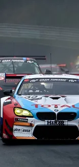 Racing cars on a misty track, showcasing high-speed dynamics and energy.
