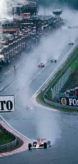 Dynamic race cars on a rainy track wallpaper.