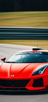 A vibrant red sports car speeding on a track, showcasing elegance and speed.