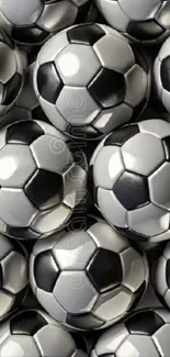 Close-up of multiple soccer balls in a dynamic pattern.