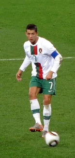 Focused soccer player on green field during match.