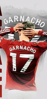 Soccer player in vibrant red jersey with name Garnacho on mobile wallpaper.